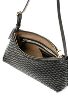 Open view of the 81 Baguette Bag, displaying the zip closure and spacious interior.