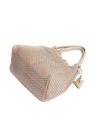 Flat-layout shot of the 09 Regular Acacia bag with its accessories, emphasising its versatility and timeless elegance.