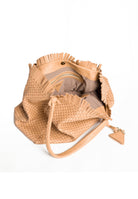 Interior view of the 09 Regular bag, displaying its spacious compartment and 100% cotton lining