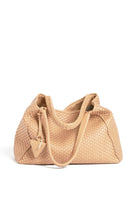 Close-up of the handle on the 09 Plain Camel bag, showcasing the detailed weaving and durable craftsmanship