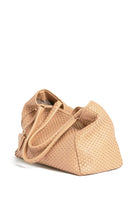 Side profile of the 09 Plain Camel bag, highlighting its structured silhouette and warm beige tone