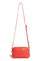 Detailed shot of the bag and its shoulder strap, crafted with traditional 18th-century