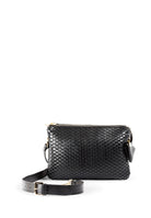 Front view of the 21 Crossbody bag by Parise, showing its intricate weave made on 18th century treadle looms.