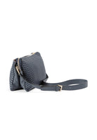 Side profile of the 21 Crossbody Bag, showcasing the intricate leather weaving