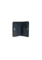 Minimalist leather cardholder showcasing slim design.