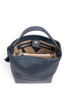 Interior of the 51 Large Bucket Bag, featuring a spacious compartment and premium cotton lining.