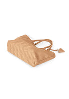 Flatlay of the 60 Medium Tote bag in Camel with accessories, emphasizing its versatility and timeless elegance.
