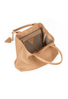 Interior view of the 60 Medium tote in camel, displaying its roomy compartment and high-quality leather lining